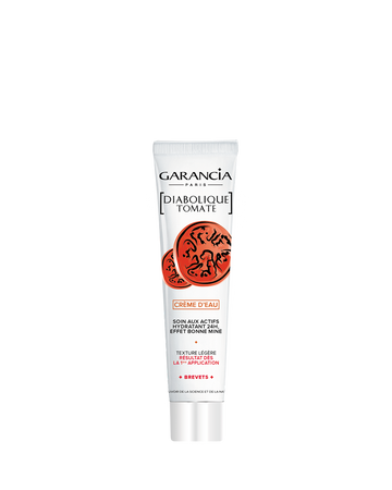 Tube blanc de la crème Diabolique Tomate Garancia illustré de coupes de tomates, affichant la mention Crème d'Eau