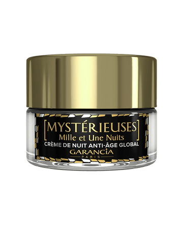 Fond transparent Laboratoire Garancia : Pot de crème de nuit anti-âge global Mystérieuses Mille et Une Nuits de Garancia. Packaging élégant noir et or avec un capot doré brillant.