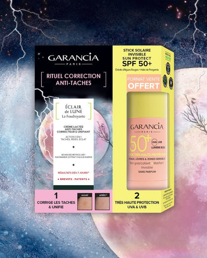 Coffret Garancia Rituel Correction Anti-Taches incluant la crème lactée Éclair de Lune La Foudroyante et le Stick Solaire Invisible Sun Protect SPF 50+ offert, présenté sur un fond cosmique avec éclairs.